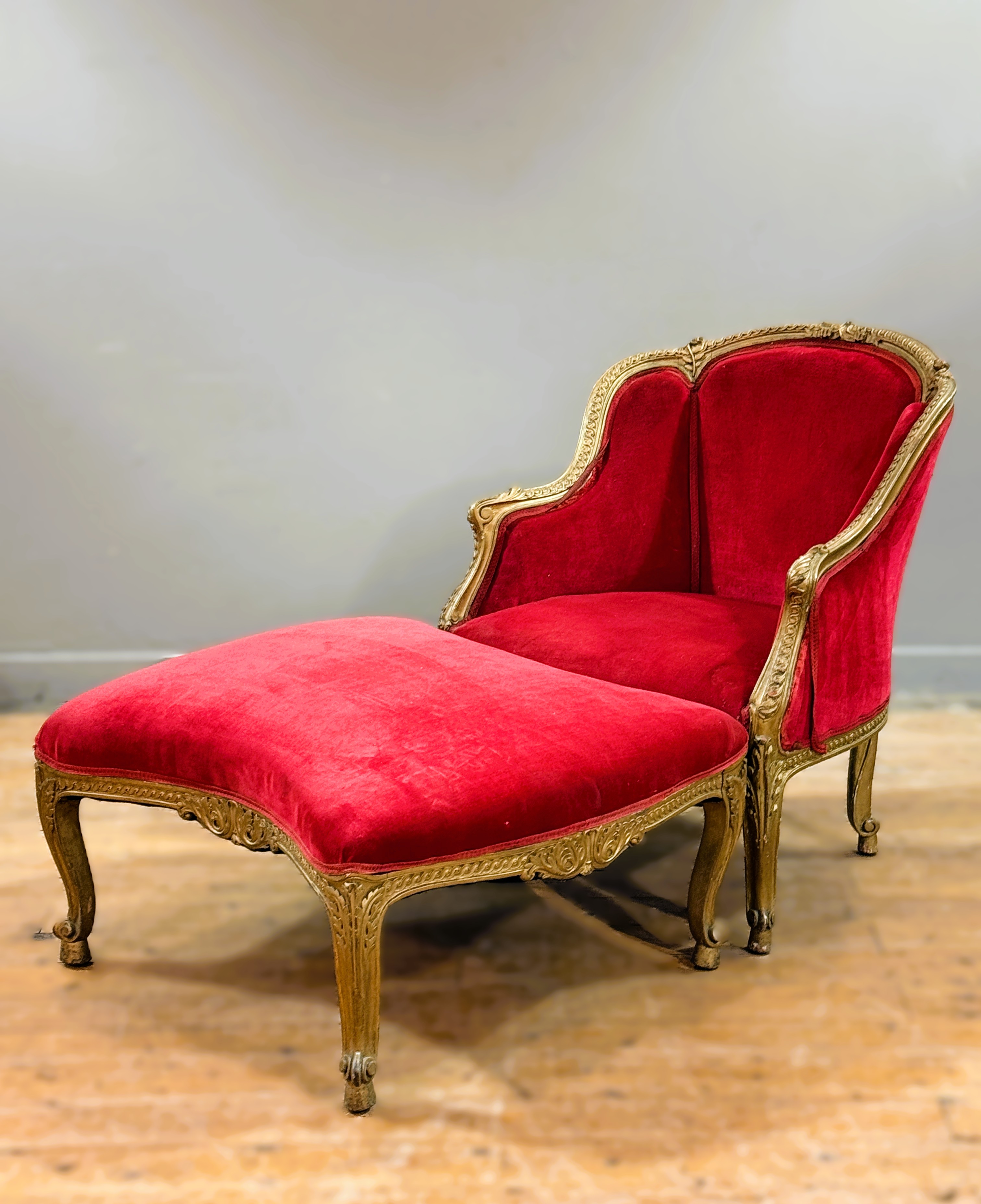 A late 19thc./early 20thc Louis XV style duchesse brisee, with scrolling giltwood painted frame,