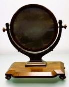 James Mein of Kelso, a William IV mahogany toilet mirror, c. 1835, the (distressed) circular