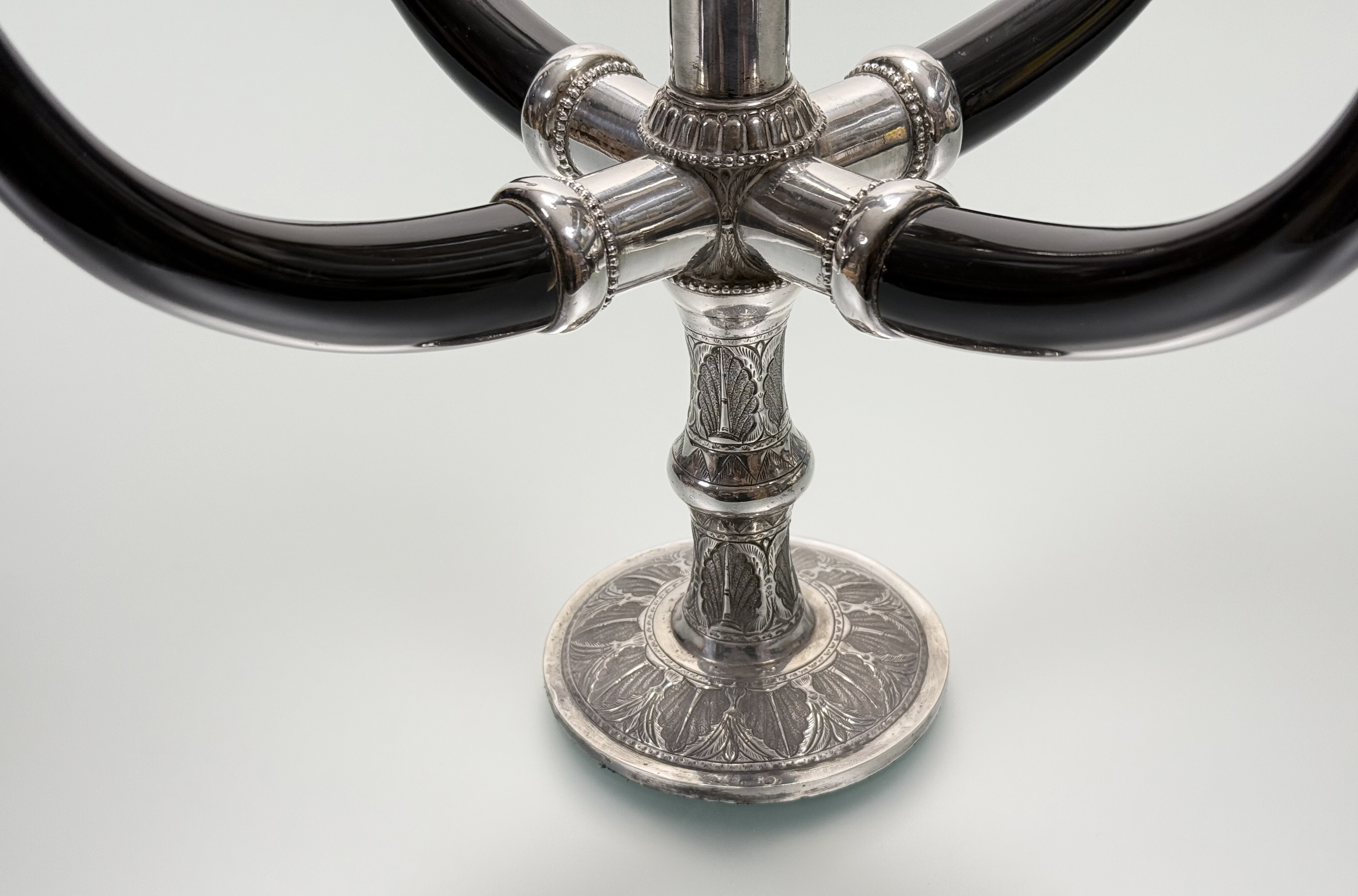 A South-East Asian silver (unmarked) and ebony five-light candelabrum, 20th century, the circular - Image 3 of 4