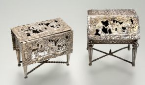 Two pieces of Dutch silver miniature furniture: a bureau with London import marks for 1890, repousse