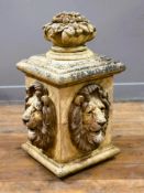A composition square section central element of a fountain, with fruit and leaf finial to top with