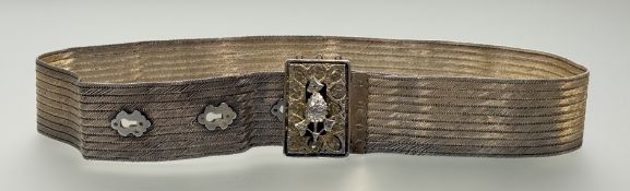 An Ottoman Empire silver and silver-gilt belt, c. 1900, the meshlink stripe belt with chased