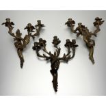 A matched suite of three gilt-bronze wall sconces in the Rococo taste, probably early 20th