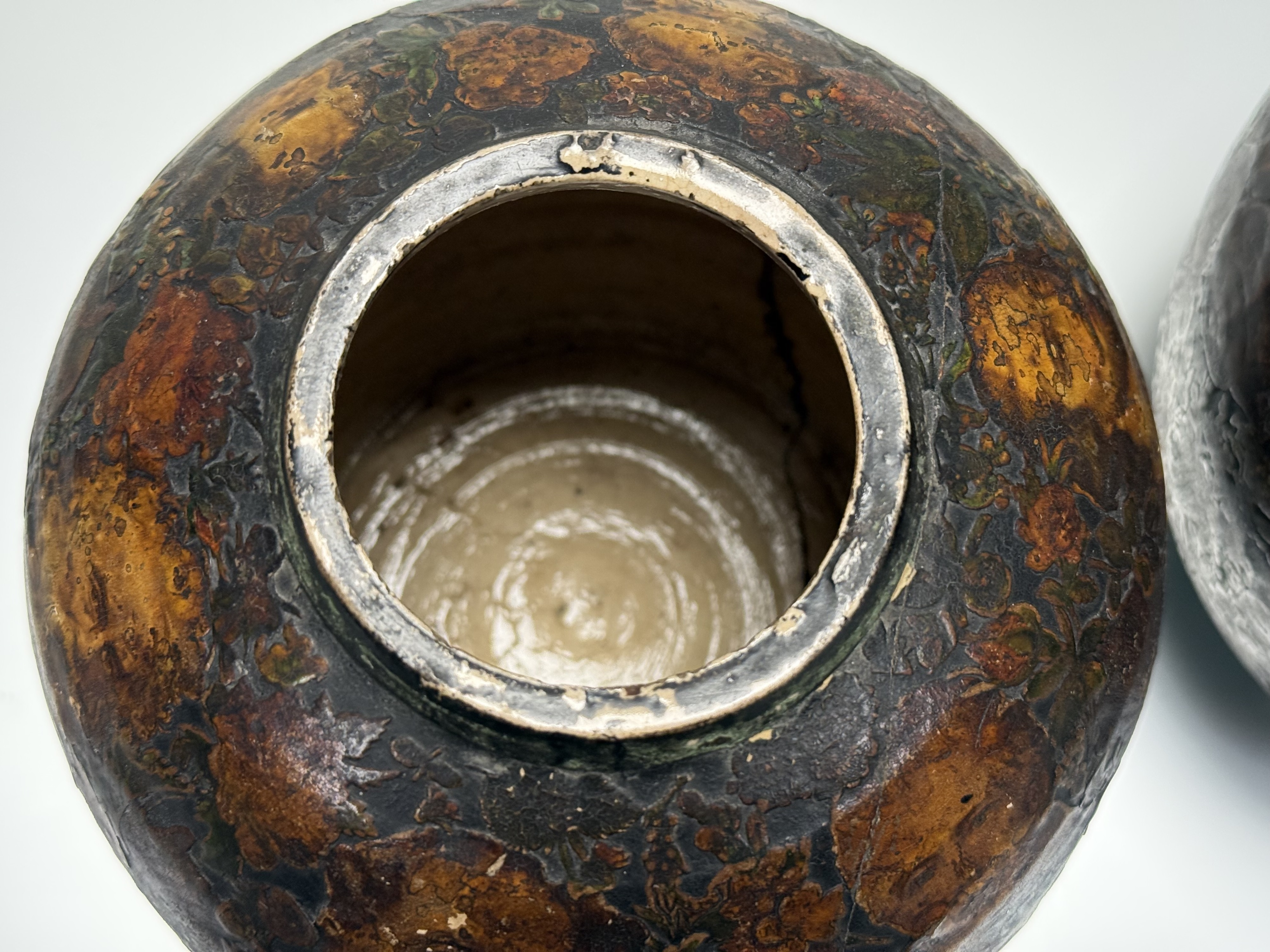 A pair of 19th century decoupage pottery urns, applied with figures and flowers, and with domed - Image 4 of 7