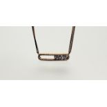 An 18ct rose gold and diamond "Move" necklace in the style of Messika, Paris, the central oval