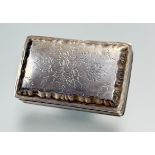A French silver snuff box, first quarter 19th centurty, the cover with engraved floral decoration