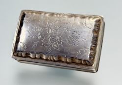 A French silver snuff box, first quarter 19th centurty, the cover with engraved floral decoration