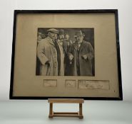 A photograph of David Lloyd George with two companions, framed with an autograph signature 