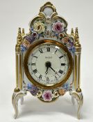 A Dresden design Sandizell porcelain mantle clock, decorated with applied porcelain flower heads and
