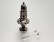 A late Victorian Sheffield silver dome top table sugar castor with flame finial and chased rose