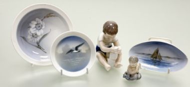 A collection of Royal Copenhagen dishes comprising, a shell shaped dish with boat to centre 579/638,