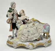 A 20thc German Unterweissbach porcelain group, depicting a parlour music scene with a gentleman