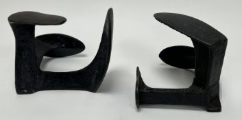 A pair of cast iron cobblers shoe lasts, one with 'The Home Ruler' to side (h. 16cm) (2)