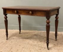 A 19th century mahogany writing table, rectangular top with moulded edges raised on shaped turned