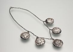 A white metal Greek chain necklace mounted with five Greek white metal reproduction coins to include
