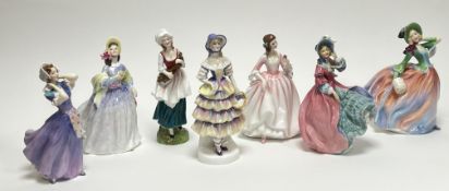 A collection of Royal Doulton figures, comprising 'Bestsy' H.N. 2111; 'Clare' H.N. 2793; 'Meg' H.