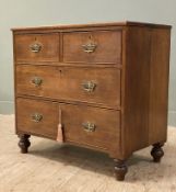 A 19th century oak chest of drawers, fitted with two short over two long drawers, brass drop handles