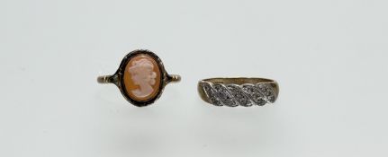 A 9ct gold oval shell carved portrait ring N/O 1.82g together with a 9ct gold scrolling ring set