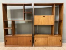 A pair of mid-century teak bookcases, each with various shelves and cupboards to base, with fall-