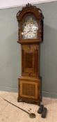 A 19th century inlaid walnut longcase clock, carved arched cornice and twin columns to hood, white