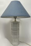 A decorative white ceramic table lamp of hexangonol form, moulded with bamboo shoots and complete