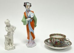 A 20thc Chinese porcelain figure of a lady dressed in traditional robes holding a fan (h. 24.5cm),