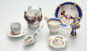 A collection of various decorative porcelain comprising, a continental school porcelain figure of