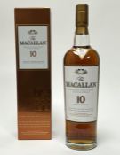 A bottle of Macallan 10 years Old Highland Single Malt Scotch Whisky, 40% Vol, 700ml, in