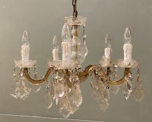 An attractive five-arm Maria Theresa chandelier, cut-glass body and droplets with brass arms, on a