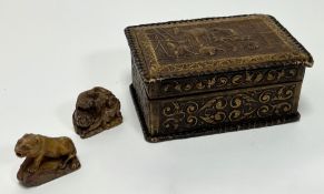 A leather-bound wooden cigar box with fitted interior, complete with embossed scene of a farmer