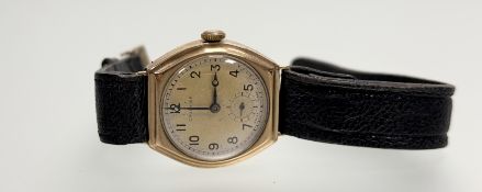 A vintage 9ct gold Denison Crusader manual wind wristwatch with champagne dial and arabic numerals