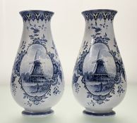 A pair of Villeroy & Boch delft style blue and white vases, with Dutch Windmill panel scene to