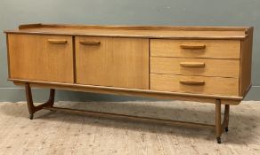 A mid-century teak sideboard by Portwood Furniture of Cheshire, ledge back and rectangular top,