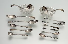 A Victorian London pair of silver fiddle pattern tea spoons: l. x 13cm London 1870 together with a