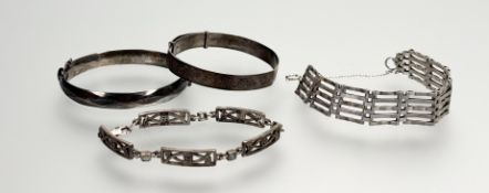 A silver cast diamond pattern bracelet with clip fastening: d. x 6.5cm 41.1g together with a