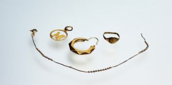 A 9ct gold faceted hoop earring 1.39g together with a 9ct gold signet style ring H 0.8g, a 9ct