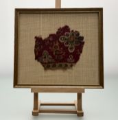 A Circa 6th Century fragment of an early egyptian coptic textile, in a glazed frame. (22.5cmx24.
