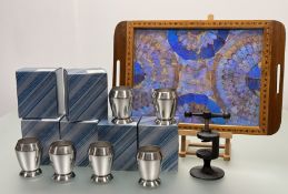 A set of six boxed stainless steel Old-Hall footed cups (h-10cm.) a Robert Welch cast-iron