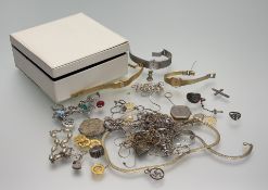 A collection of costume, white, gilt metal and silver jewellery to include rings, chains, charms,