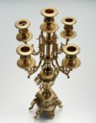 A decorative rococo style gilt metal four branch with one centre candelabra. (h-43cm)