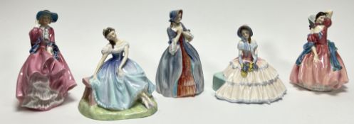 A collection of Royal Doulton figures, comprising 'Top of the Hill'; 'Giselle' H.N. 2139; 'Deidre'