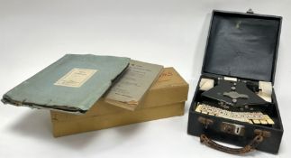 A cased vintage Stenotype 'Grandjean' shorthand typewriter within a fitted case, together with a