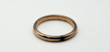 A yellow metal wedding band reduced unmarked O 2.57g