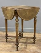 A late 19th century French lamp table, inlaid rosewood with floral inlaid top over four demi-lune