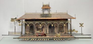 Robert Wiley (American), Train Station Wall Sculpture piece, in hand-crafted brass metal. (h-50cm
