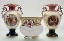 A near pair of twin scrolling handle baluster vases,each with hand-painted continental panel