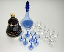 A collection of glassware comprising, a ten sherry glasses, six bristol blue liquor glasses, a