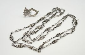 A white metal Lucken Booth brooch with engraved inscription verso L.G. McDowell, Hollyrood 191: h. x