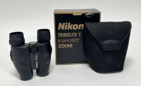 A pair of Nikon Travelite V 8-24 X 25CF Zoom binoculars, within presentation box and with travel