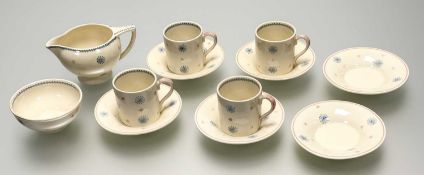 A 1950's Susie Cooper pink and blue star burst pattern part coffee service, comprising a sugar